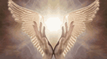 a painting of a pair of hands with angel wings