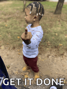 a little girl giving the middle finger with the words get it done below