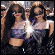 two women wearing sunglasses are standing next to each other on a city street