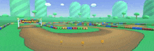 a blurred image of a video game track with a sign that says mario kart