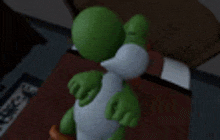 a green and white yoshi toy is standing on a red rug in a room .