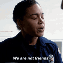 a police officer says we are not friends