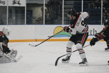 a hockey player wearing a jersey that says collora on it