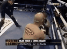 a boxer with a tattoo on his back that says that 's too