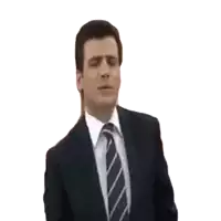 a man in a suit and tie is making a face