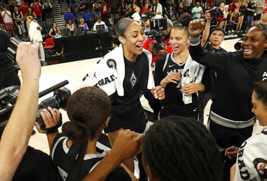 Las Vegas Aces center A’ja Wilson, center, celebrates teammates after the Aces defeated the Dallas Wings in an WNBA basketball game at Michelob Ultra Arena in Mandalay Bay Sunday, July 7, 2024.