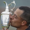 Xander Schauffele of the United States kisses the Claret Jug trophy after winning the British Open Golf Championships at Royal Troon golf club in Troon, Scotland, Sunday, July 21, 2024.