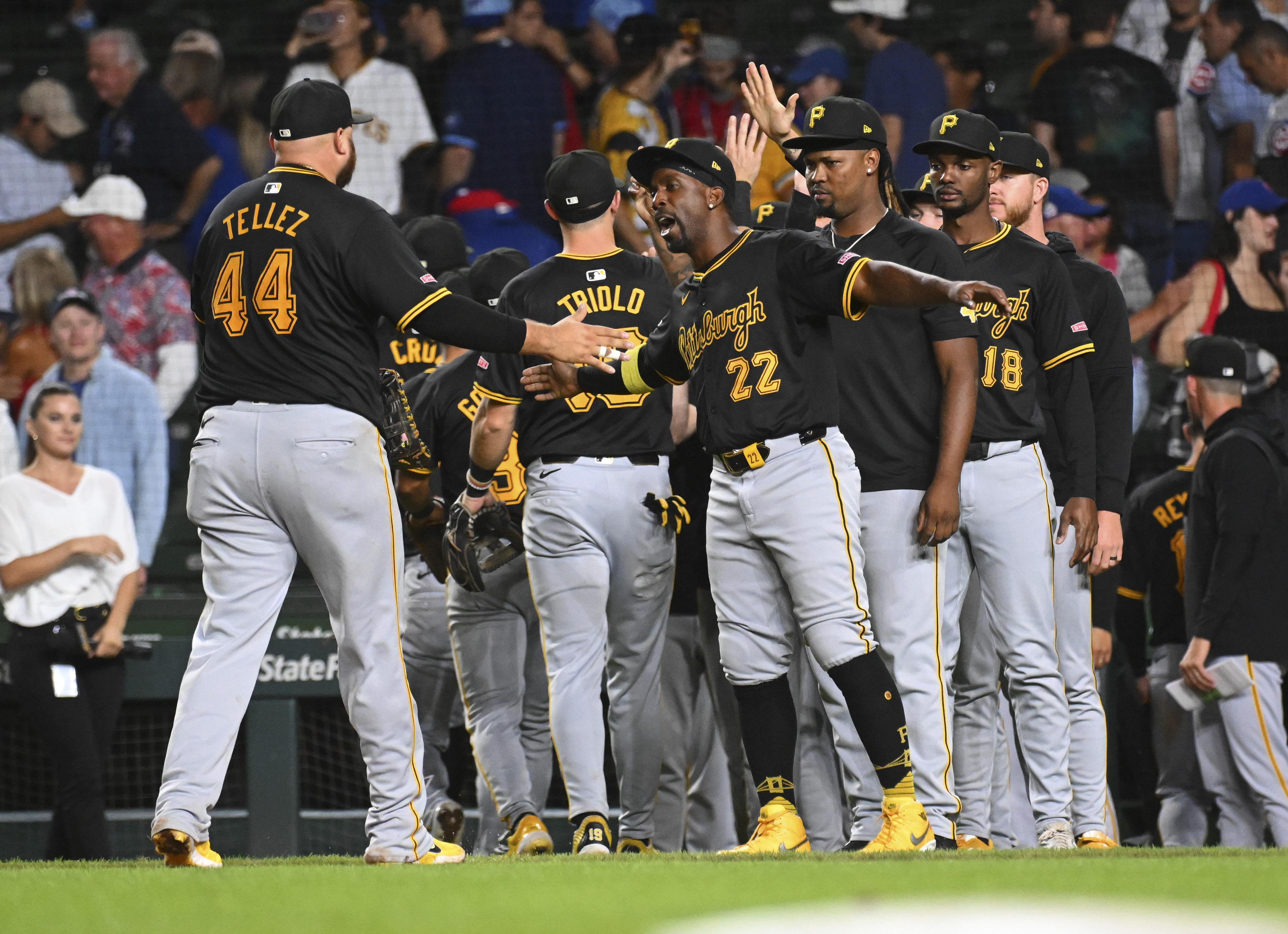 CHICAGO, ILLINOIS – SEPTEMBER 03: Rowdy Tellez #44 and Andrew McCutchen #22 of the Pittsburgh Pirates celebrate with teammates after their team win over the Chicago Cubs at Wrigley Field on September 03, 2024 in Chicago, Illinois. The Pirates defeated the Cubs 5-0. (Photo by Nuccio DiNuzzo/Getty Images)