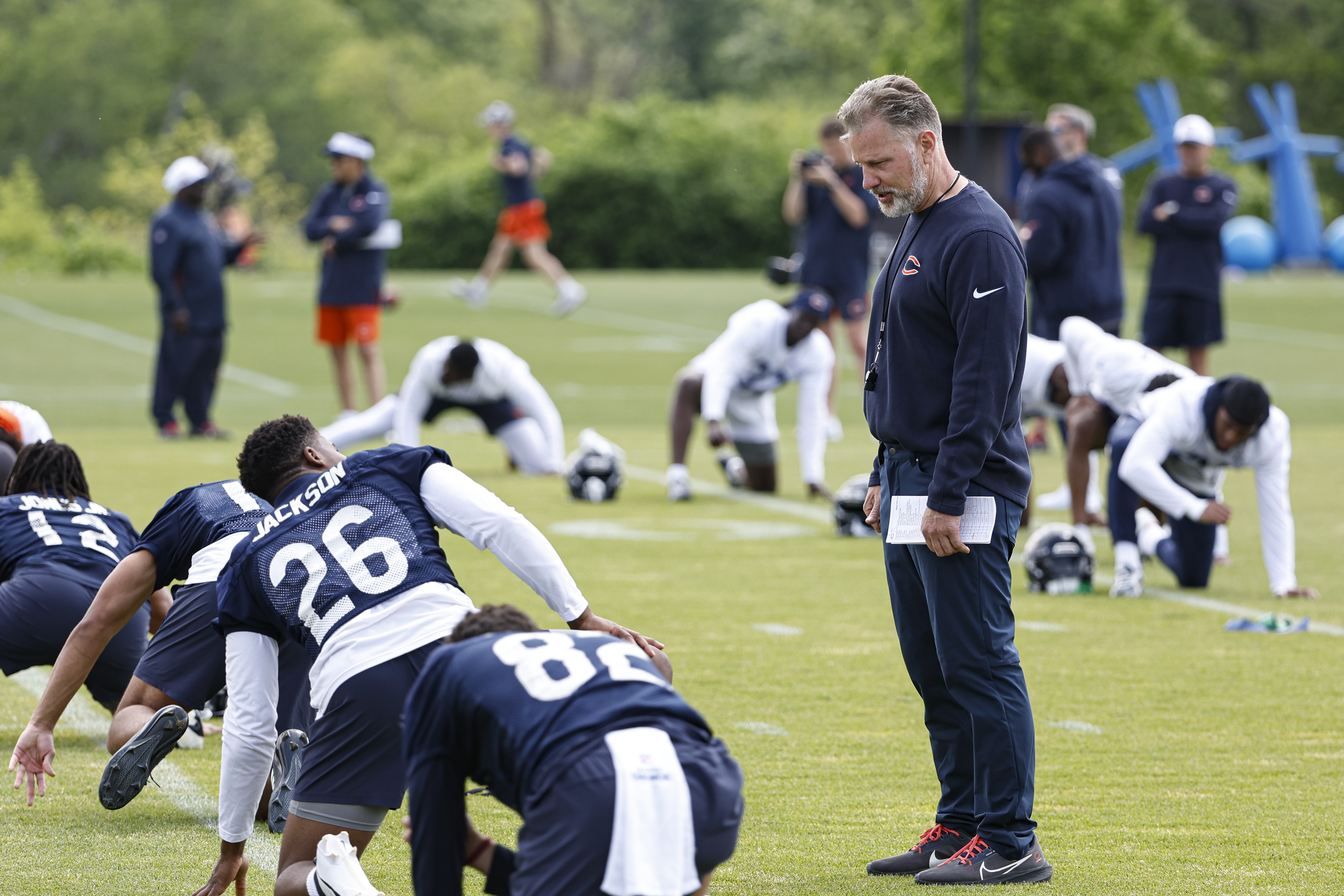 Jun 5, 2024; Lake Forest, IL, USA; Chicago Bears head coach Matt Eberflus talks with Chicago Bears wide receiver John Jackson (26) during the team’s minicamp at Halas Hall. Mandatory Credit: Kamil Krzaczynski-USA TODAY Sports