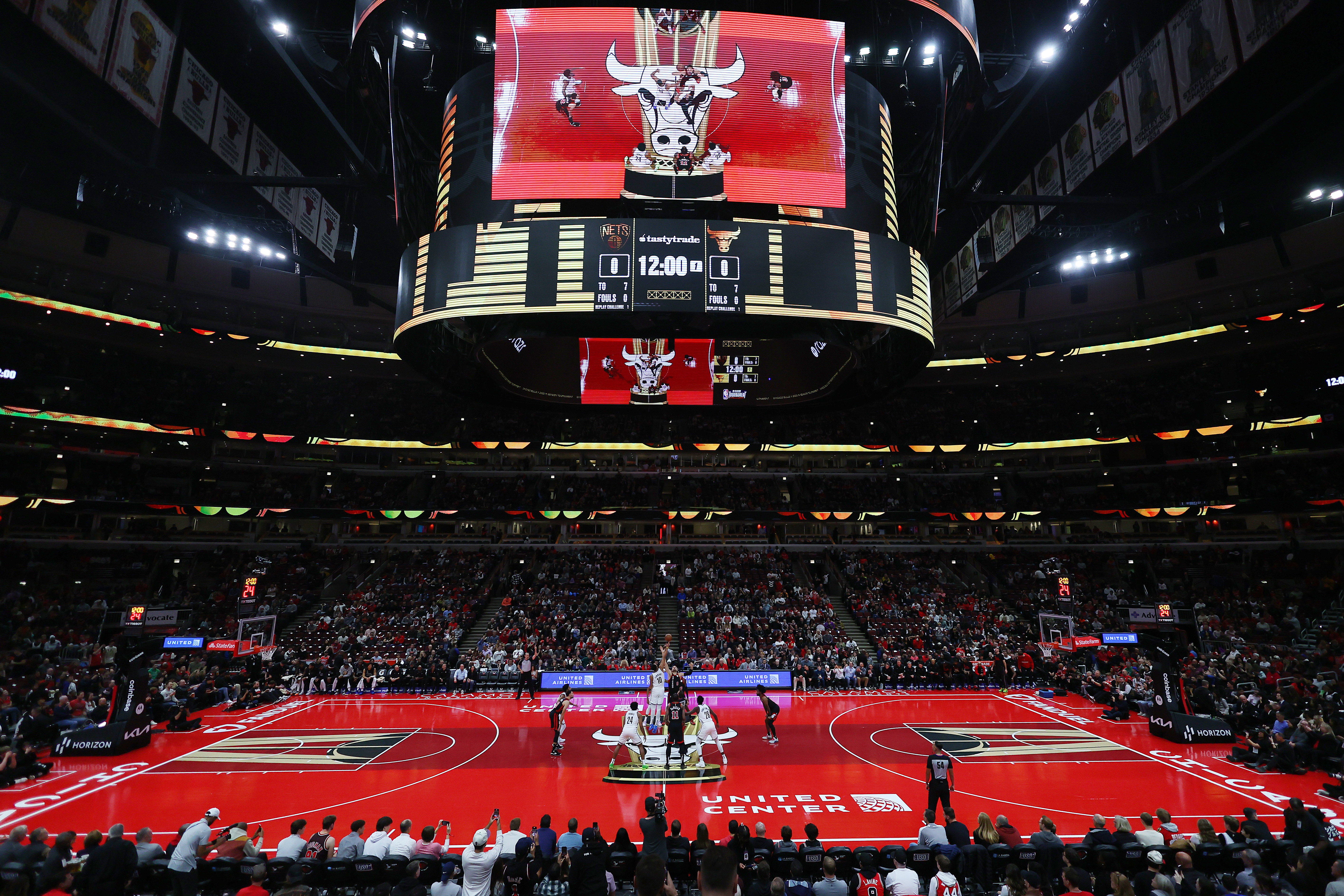 Ben Simmons of the Brooklyn Nets and Nikola Vucevic of the Chicago Bulls tip-off the game during the NBA In-Season Tournament at the United Center on November 03, 2023 in Chicago, Illinois.