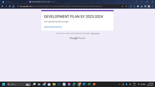 a computer screen shows a development plan sy for the year 2023-2024