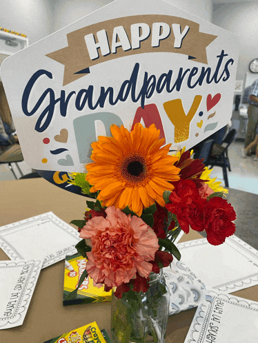 a sign that says happy grandparents day on it