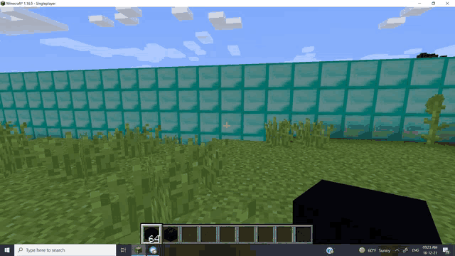 a screenshot of a game called minecraft with the time of 12:13 am