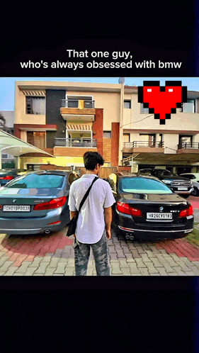 that one guy who 's always obsessed with bmw stands in front of a house