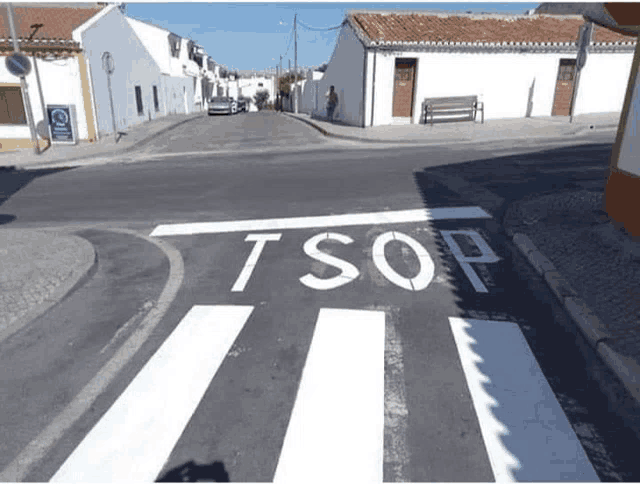 the word tsop is painted on the road