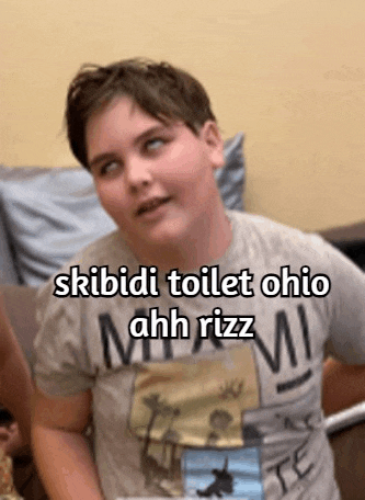 a boy wearing a miami shirt says skibidi toilet ohio