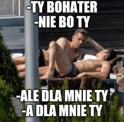 a couple of men laying on a couch with a caption that says ty bohater nie bo ty ale dla mnie ty