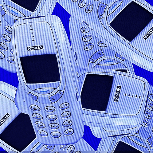 a bunch of nokia phones are laying on a blue background