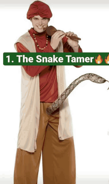 a man in a snake tamer costume is holding a snake in his hand