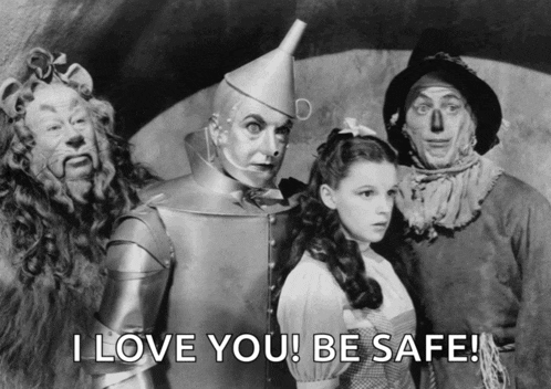 a black and white photo of the wizard of oz characters says i love you be safe