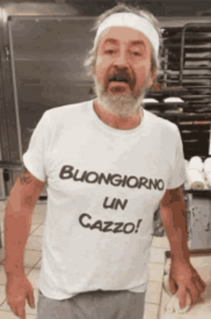 a man wearing a shirt that says buongiorno on it