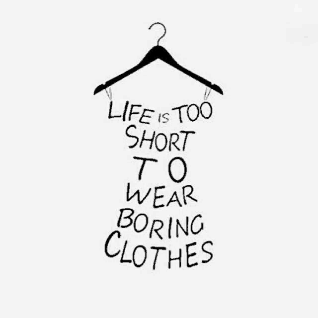 a hanger with the words " life is too short to wear boring clothes " on it