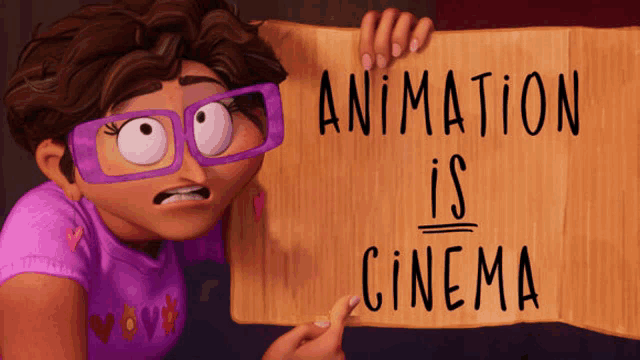 a girl with glasses holds a sign that says animation is cinema