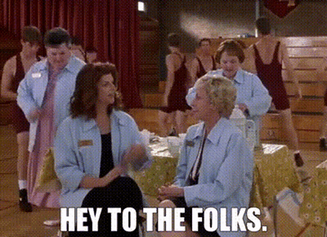 a group of women are sitting around a table with the words hey to the folks written on the bottom