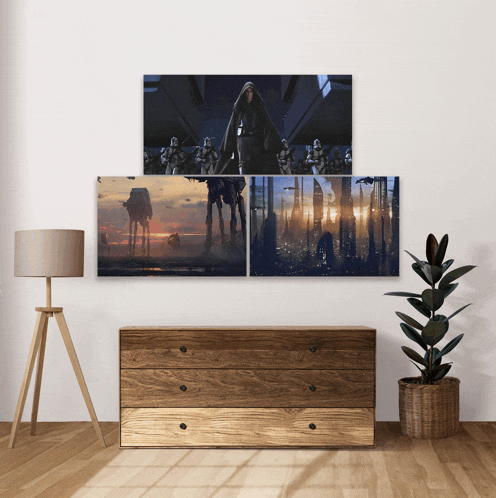 a room with a dresser and a plant with three pictures on the wall above it