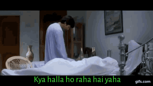 a man is standing in front of a bed with the words kya halla ho raha hai yaha on the bottom