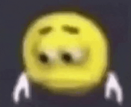 a blurry picture of a yellow smiley face with a sad face and white arms .