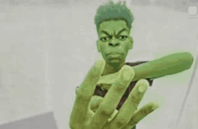 a cartoon of a man dressed as the incredible hulk is giving the middle finger .