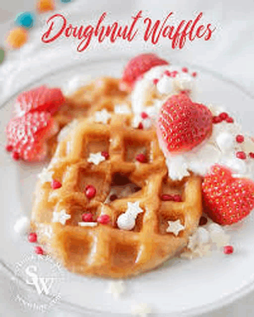 a plate of doughnut waffles with strawberries and whipped cream .