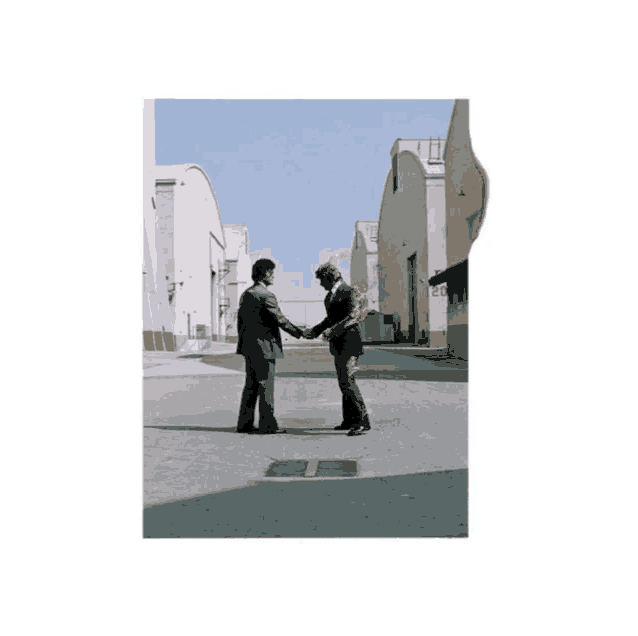 a man in a suit shakes hands with another man with flames on their pants