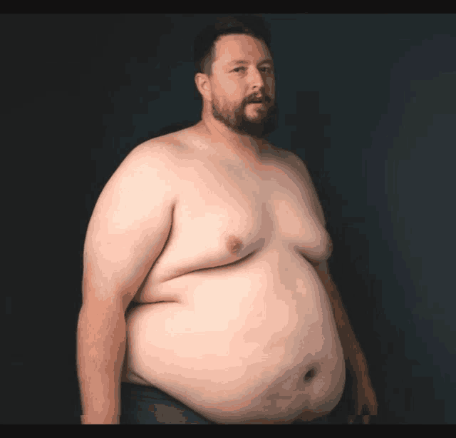 a shirtless man with a beard and a very large belly