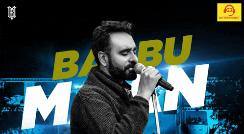 a man singing into a microphone with the words babu man on the bottom