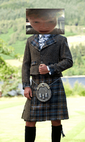 a man wearing a kilt has a picture of a child in the background