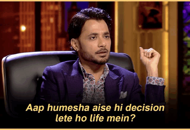 a man sitting in a chair with the words " aap humesha aise hi decision lete ho life mein " on the bottom