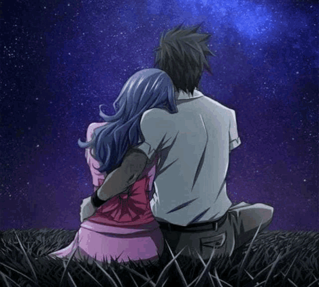 a man and a woman are sitting on the grass under a starry sky .