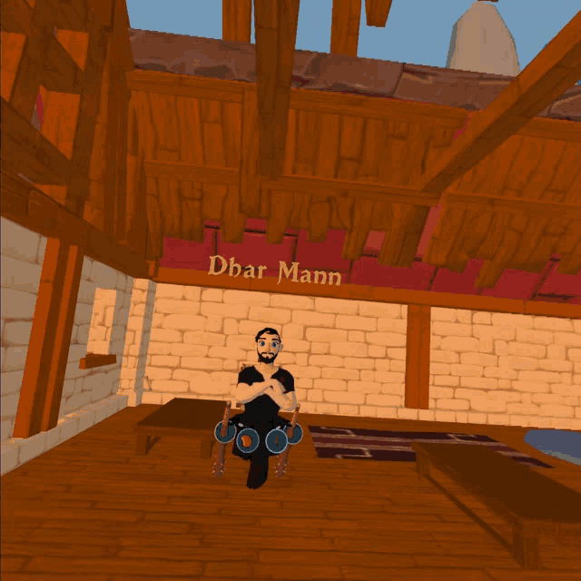 a man in a wheelchair is sitting in front of a sign that says dhar mann