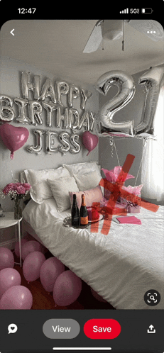 a bedroom decorated for a 21st birthday with balloons and flowers