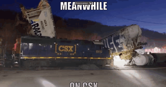 a csx train that has crashed into another train with the caption meanwhile on csx