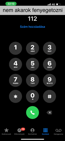 a phone screen displays the number 112 on it