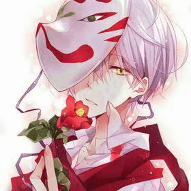 a boy with a mask on his face is holding a flower .