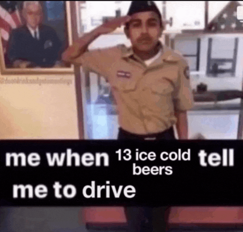 a man in a military uniform is saluting in front of a picture of a man .