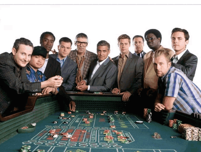 a group of men are standing around a roulette table with the letters a and b on it