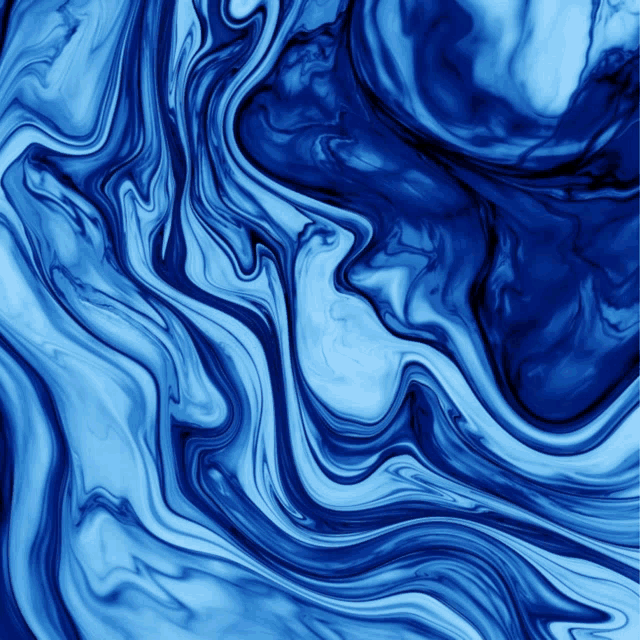 a close up of a blue and white swirl