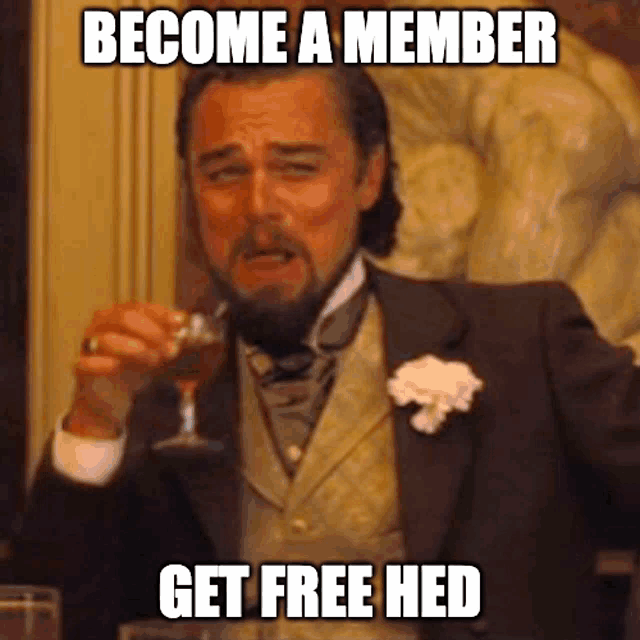 a man in a suit is holding a glass of wine and says become a member get free hed