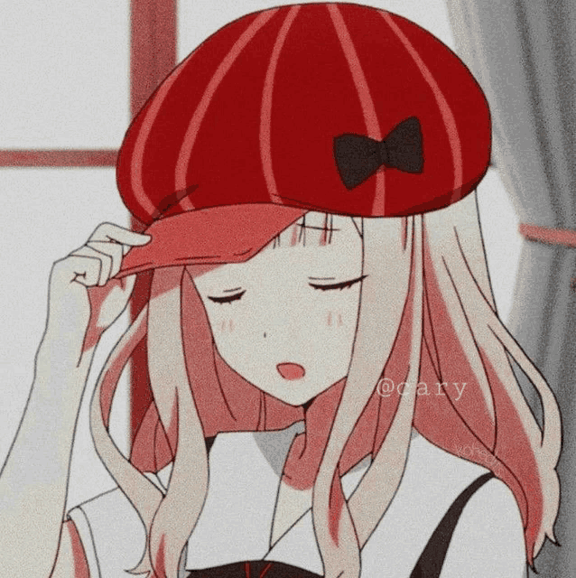 a girl with pink hair wearing a red hat with a bow on it