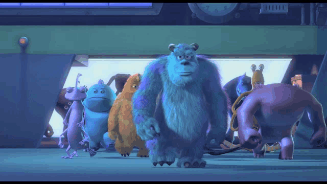 a group of monsters from the movie monsters inc are standing in a room